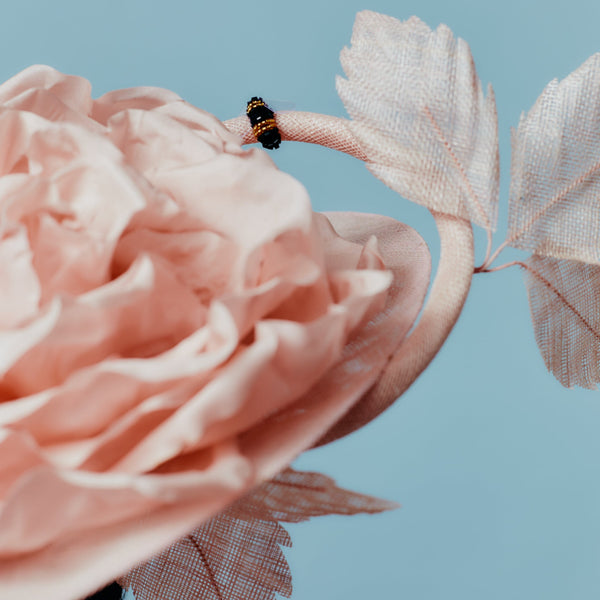 pink boater with giant rose