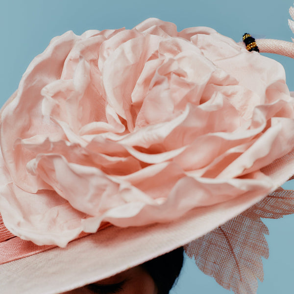 pink boater with giant rose