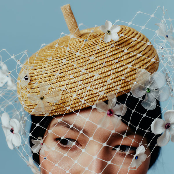 veiled straw beret with silk flowers