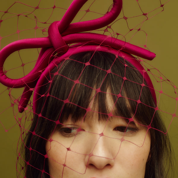 awon golding purple veiled statement bow headband close up