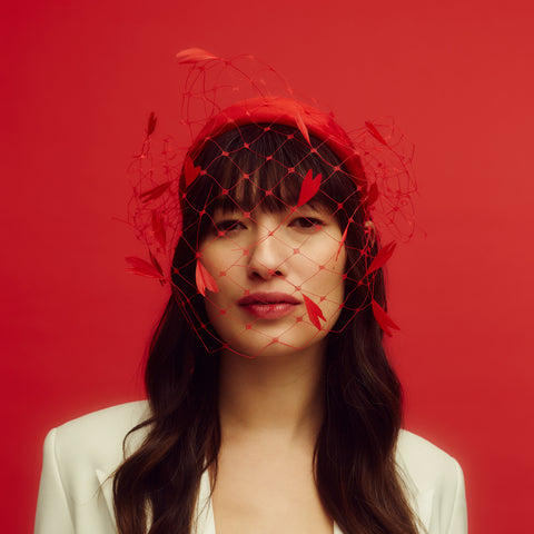 Awon Golding Maui red abstract veil with heart shaped feathers