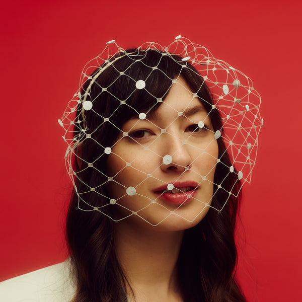 Awon Golding polka dot veiled headband