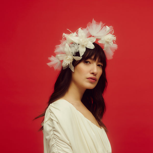 Awon golding lily and tulle bridal headpiece set on a wire headband, side view