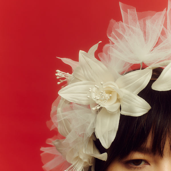 Awon golding lily and tulle bridal headpiece set on a wire headband, details