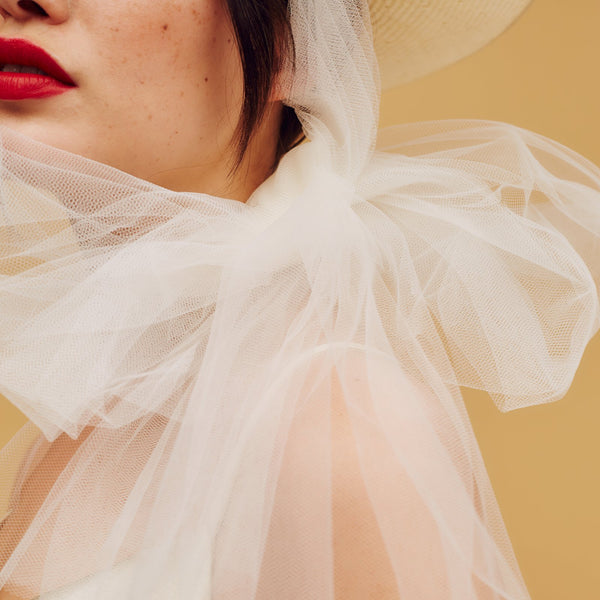Ivory white parasisal straw boater with tulle under-chin ties - Awon Golding Millinery