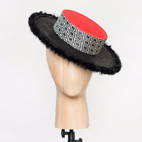 Mao - Sinamay & pinokpok boater with geo-woven rattan fabric, bead and feather trim.