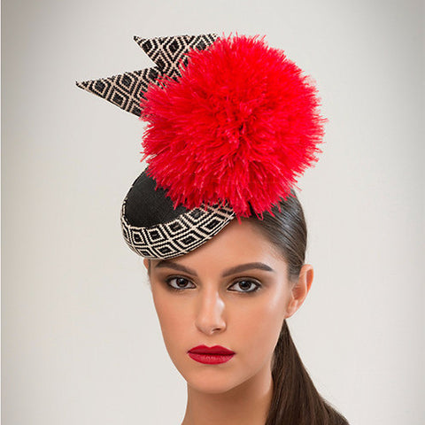 Sema - Pinokpok & geo-woven fabric base with giant ostrich pom pom.