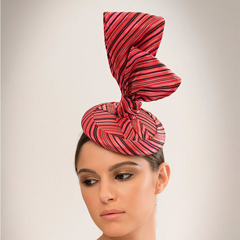 Tangkhul - This chic cocktail hat is made from delicate silk woven fabric bow on straw disc base.
