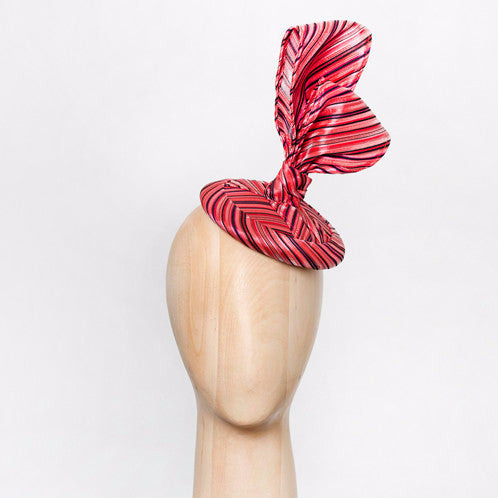 Tangkhul - This chic cocktail hat is made from delicate silk woven fabric bow on straw disc base.