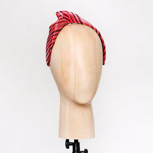 Ao - This structured turban headband is made from delicate silk woven fabric and is a flattering addition to either a casual or dressy outfit.