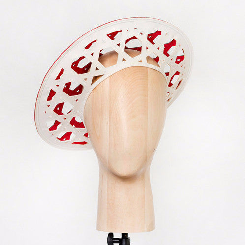 Konyak - This laser-cut two-tone neoprene beret is a chic addition to the modern woman's wardrobe. Best of all, it packs flat!