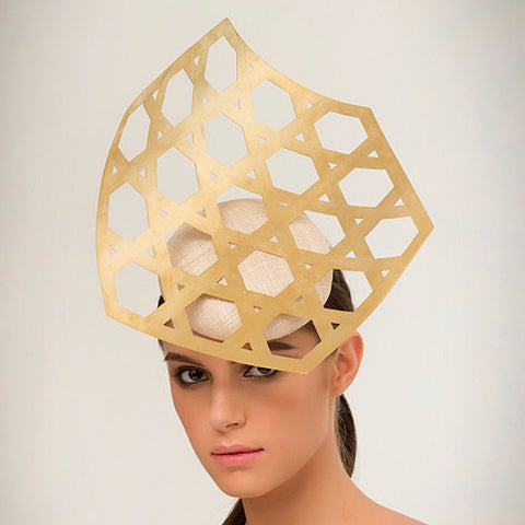 Kohima- Laser-cut geometric brass on pinokpok base. This is perfect for someone looking to make a bold, modern statement. 
