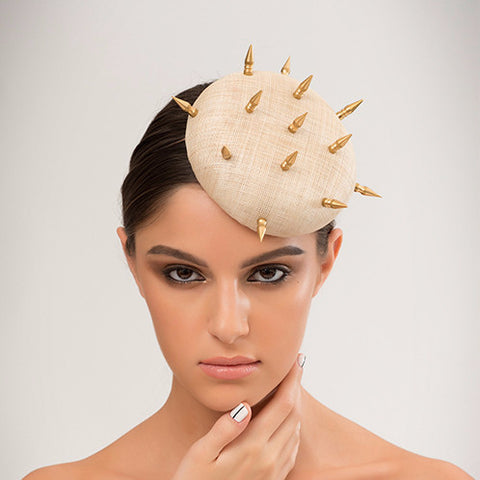 Lotha - Pinokpok disc base with brass spikes. Hard-edged but cute as a button.