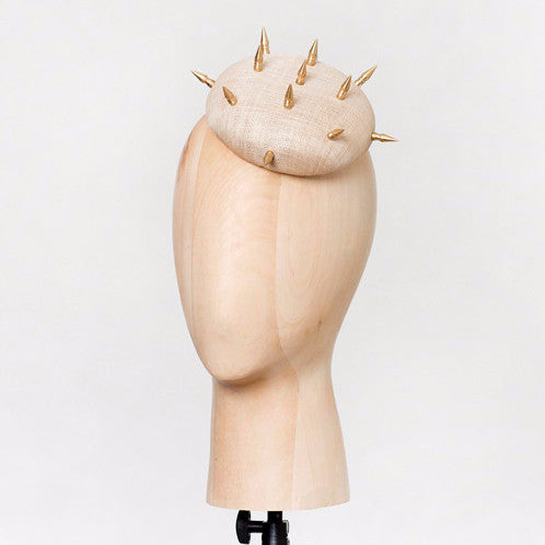 Lotha - Pinokpok disc base with brass spikes. Hard-edged but cute as a button.