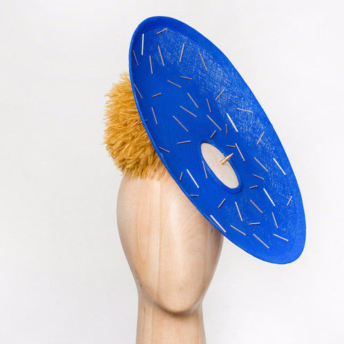 Pitt - Beaded cobalt pinokpok over-sized disc with gold bugle bead detailing, giant ostrich pom pom and single brass spike trim. The perfect Ascot hat.