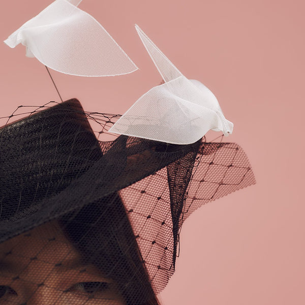 Black buntal straw boater with tulle and net veiling and hand-made ivory ombre crinoline birds. - Awon Golding Millinery