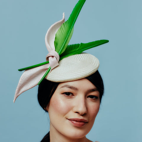ivory buntal straw beret with pink straw bow and green goose feathers