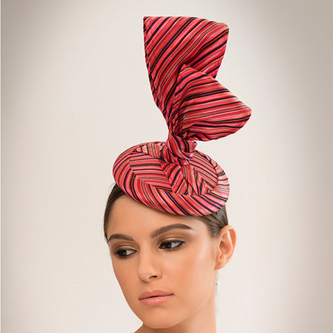 Tangkhul - This chic cocktail hat is made from delicate silk woven fabric bow on straw disc base. 
